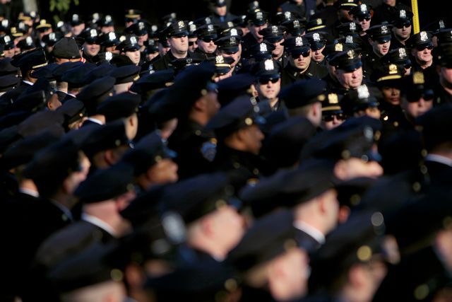 Police from across the nation line up for the funeral of slain NYPD Officer Peter Figoski